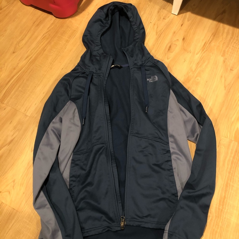Gently used North Face, navy blue zip up jacket